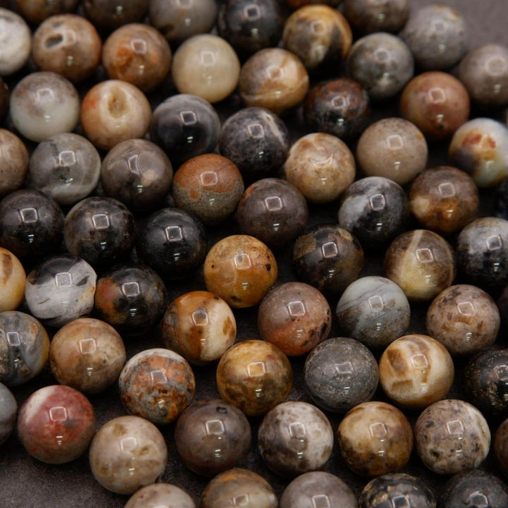 Close-up of multicolored marbled beads.