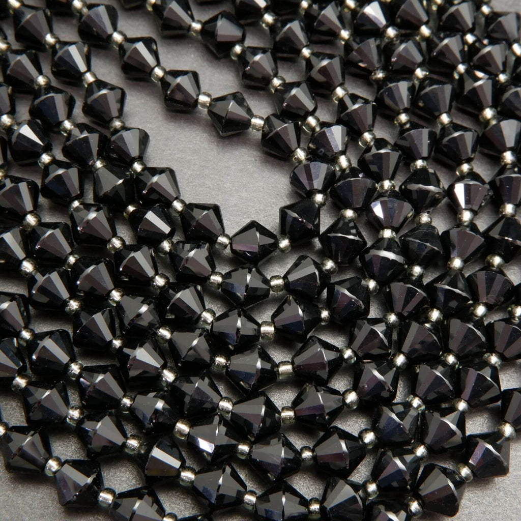 Black onyx bicone shape beads.