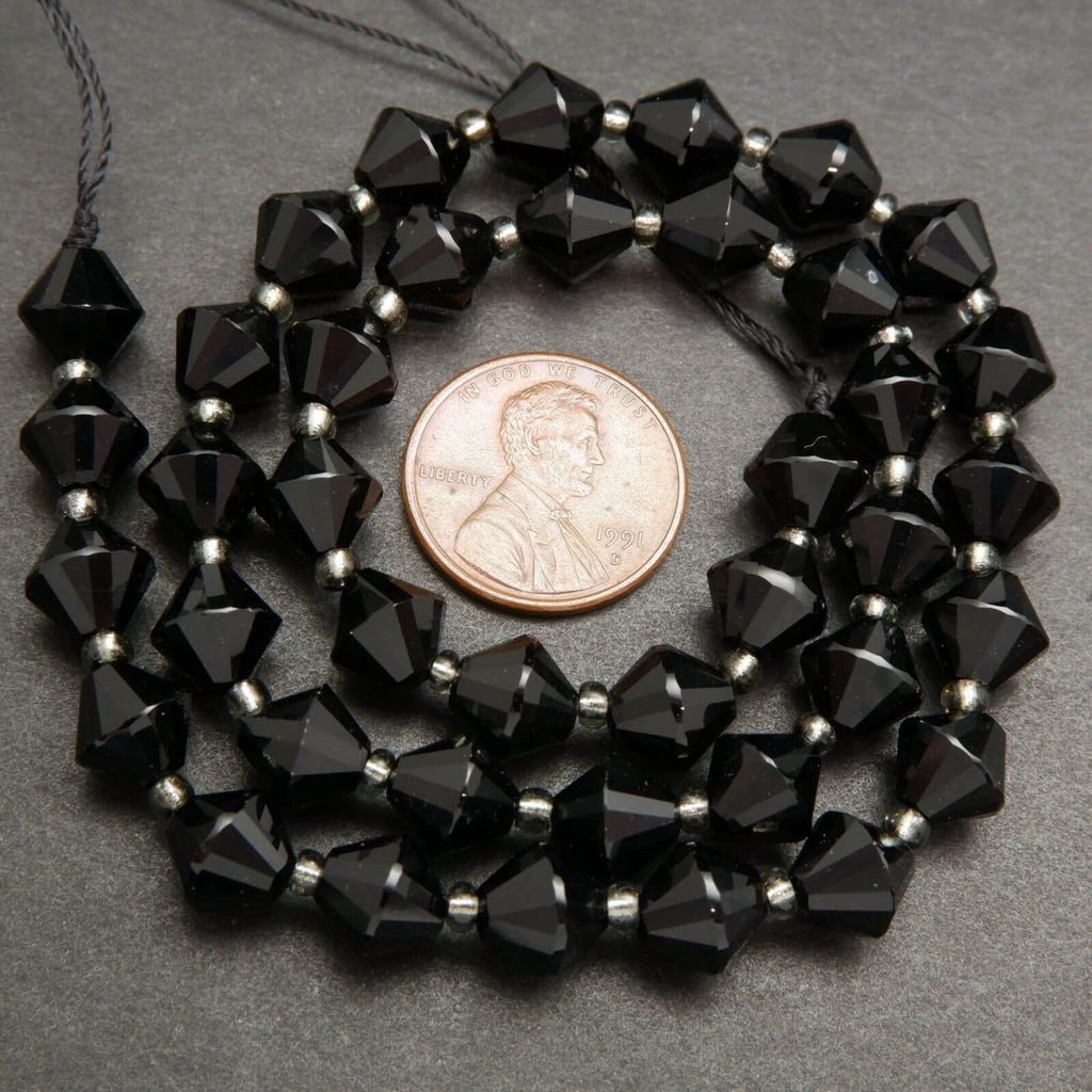 Black onyx bicone shape beads.
