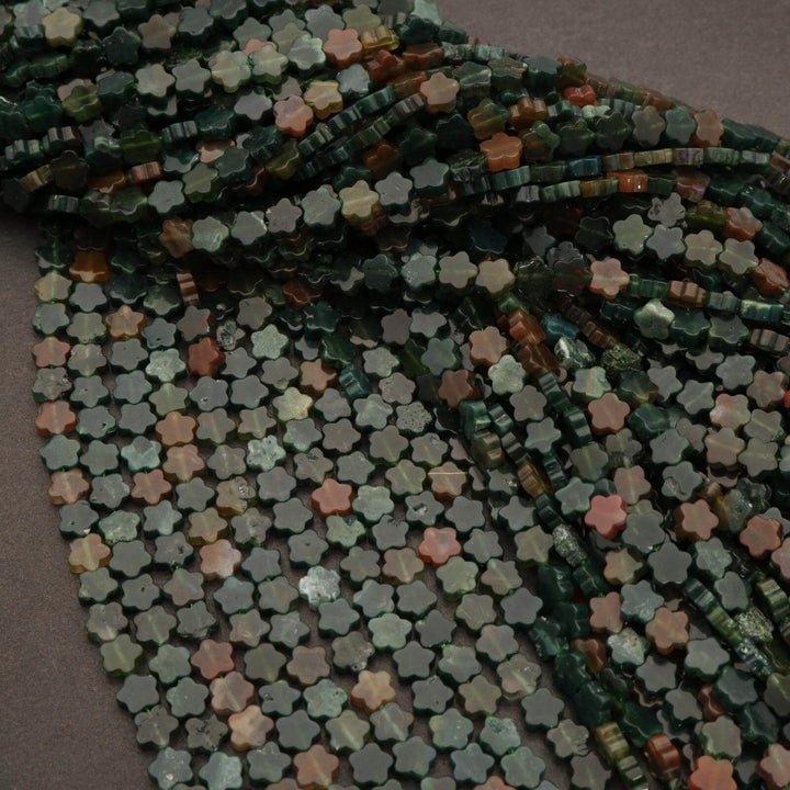 Close-up of a string of multicolored beads on a dark background