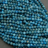 Faceted round blue beads.