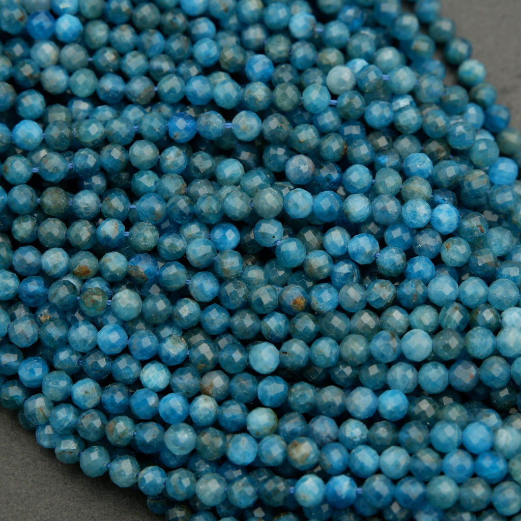 Faceted round blue beads.