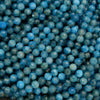 Faceted round blue beads.