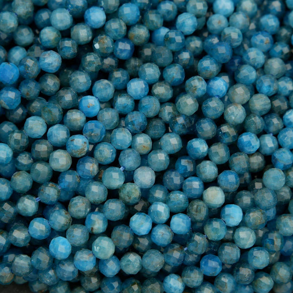 Faceted round blue beads.