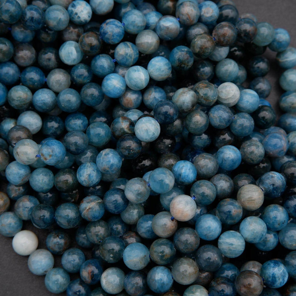 Close-up of blue beads on a dark background