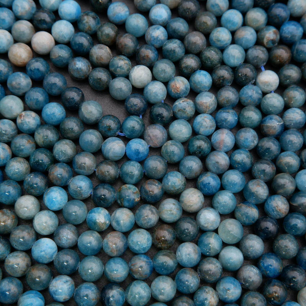 Close-up of blue beads with a dark background