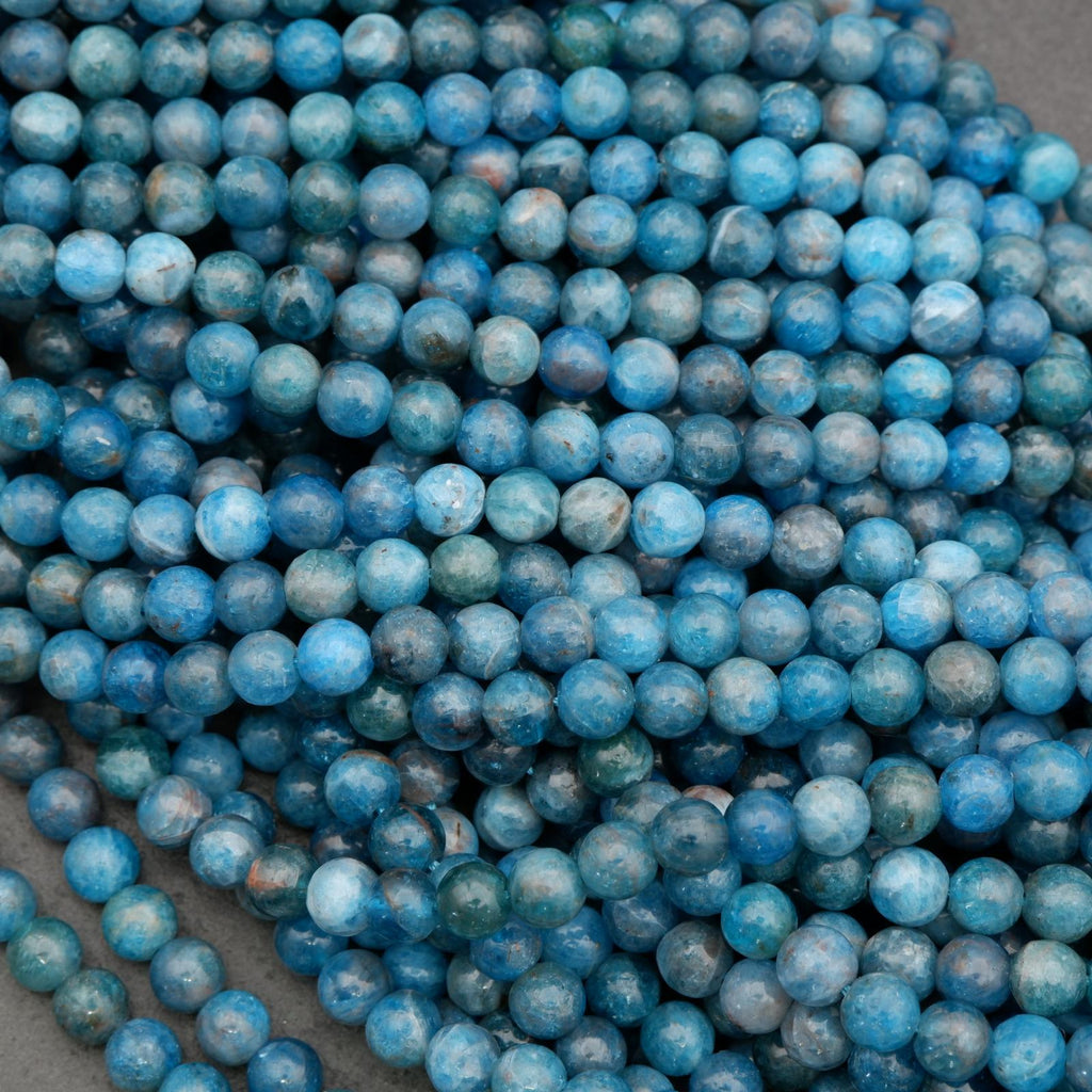 Round blue apatite beads in ocean blue tones