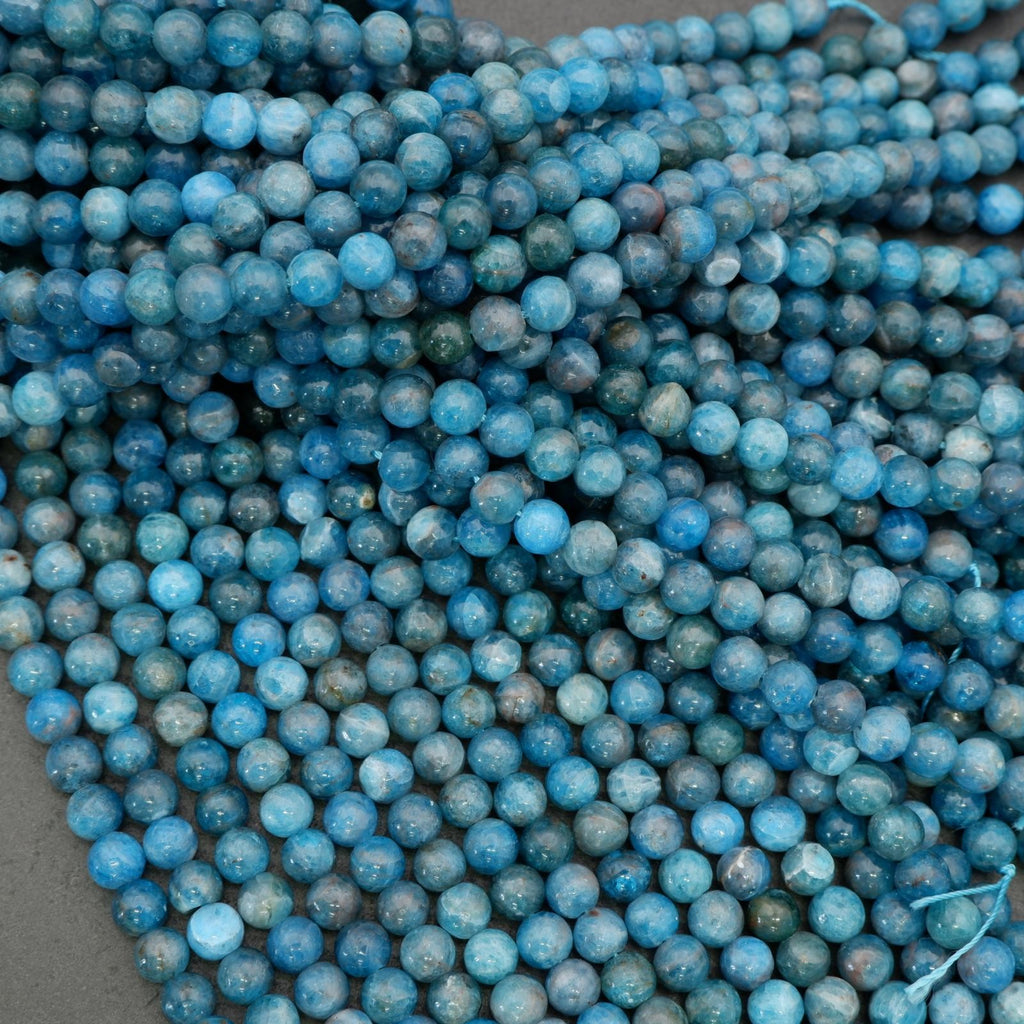 Blue apatite stone beads with organic marbling