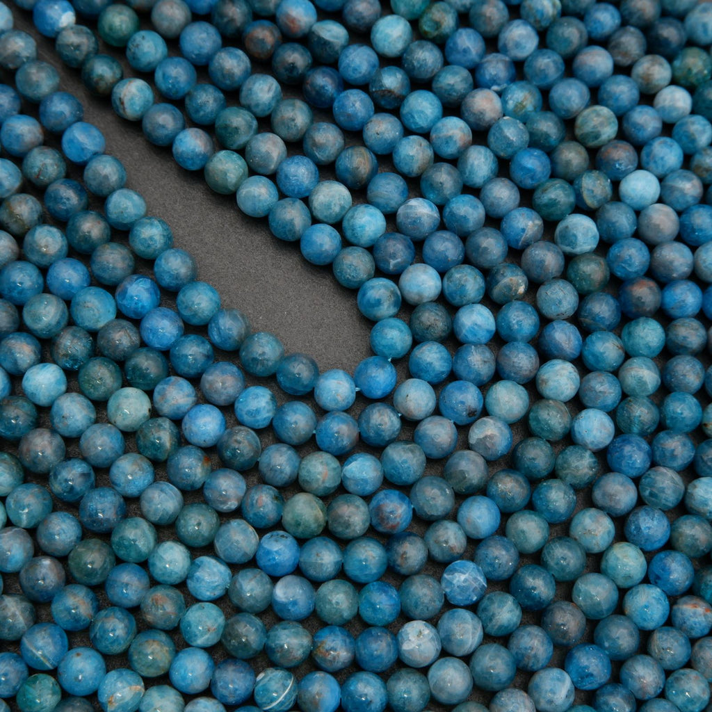 Natural apatite beads with teal and aqua hues