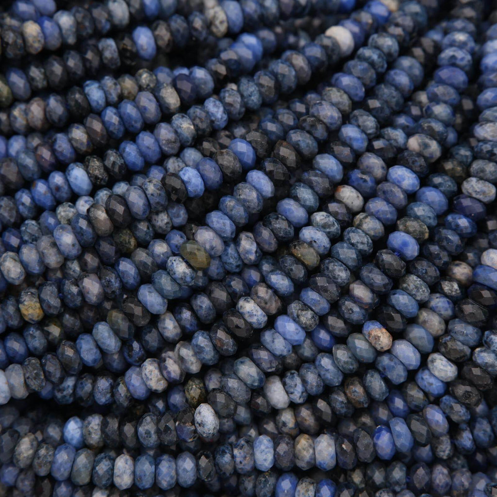 Close-up of blue beads arranged in a pattern