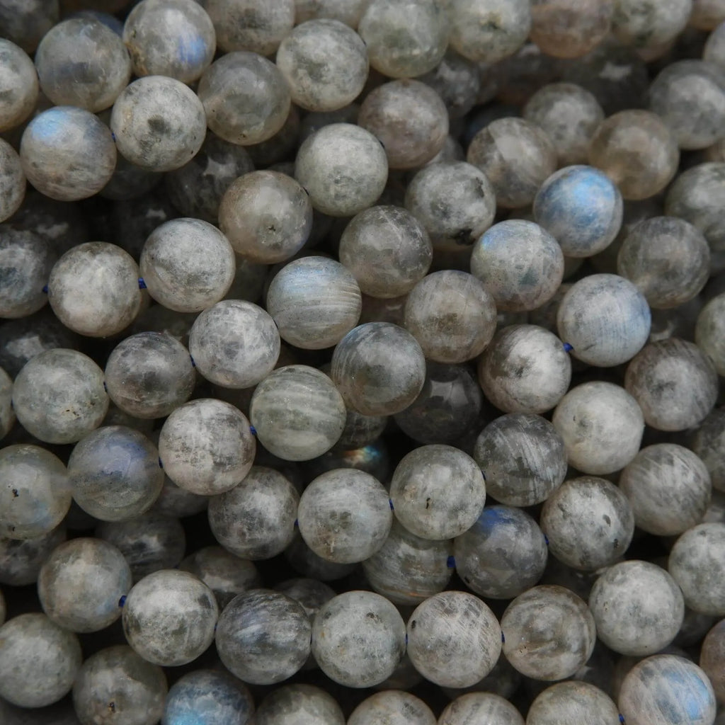 Close-up of grayish-beige spherical beads.