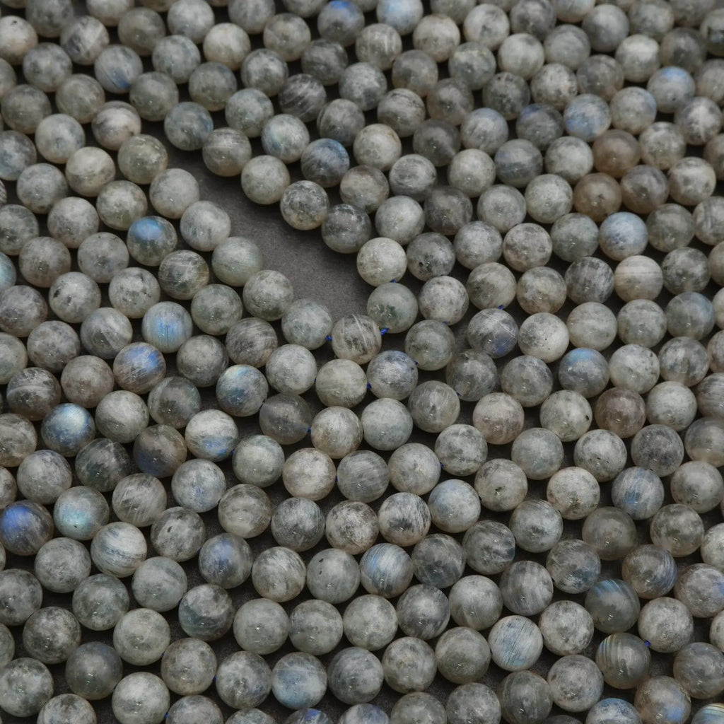 Close-up of gray beads with a blurred background