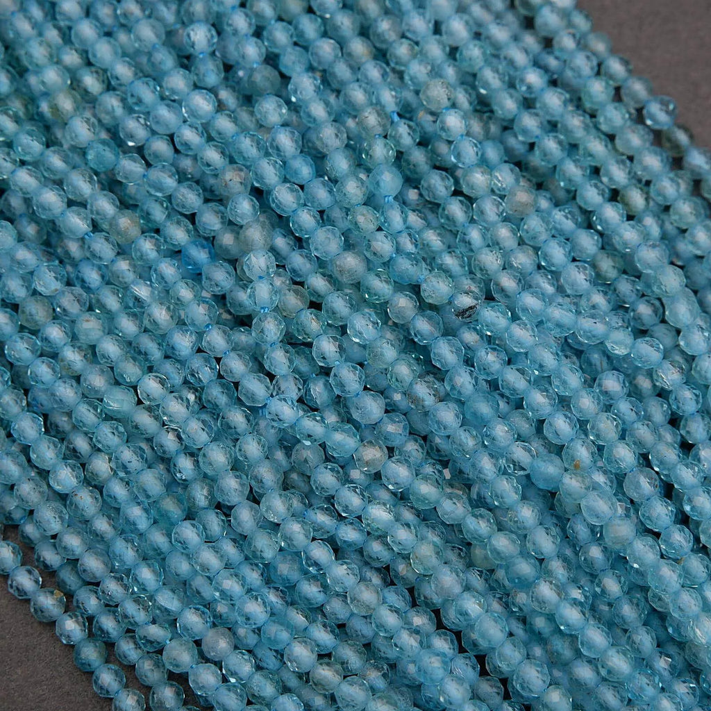 Close-up of blue beads on a dark background
