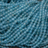 Close-up of blue glass beads