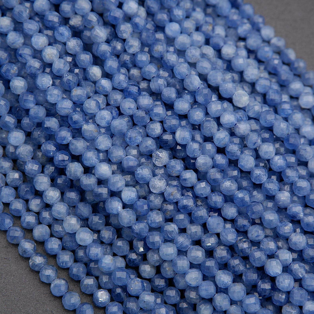 Close-up of blue beads on a dark background