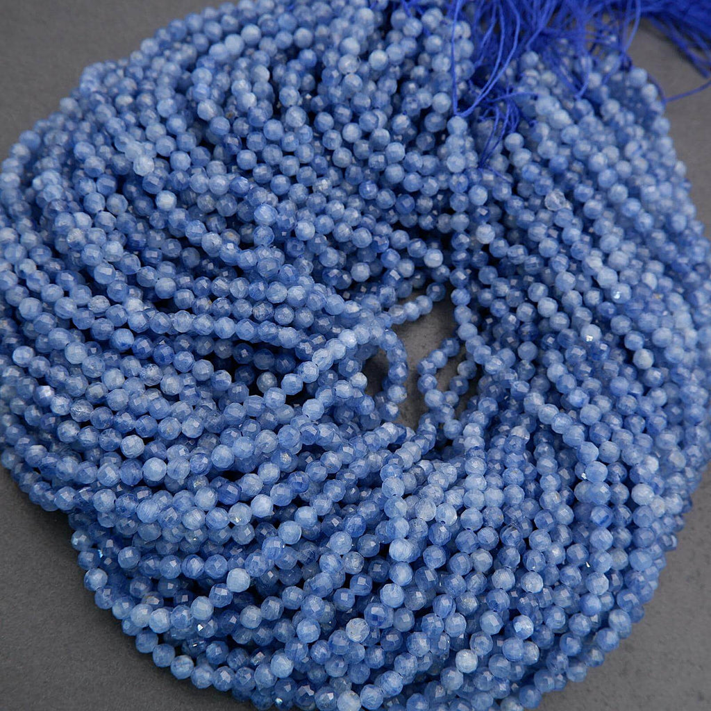 String of blue beads on a gray background