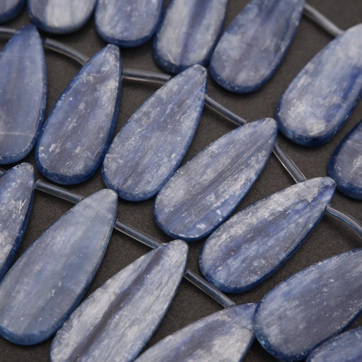 Close-up of blue stone tiles arranged on a grid