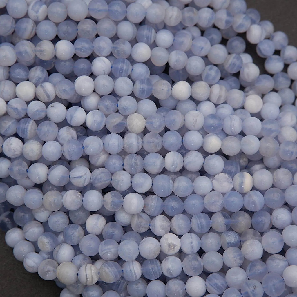 Close-up of blue and white marbled beads.