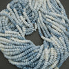 Blue and white natural stone rondelle beads macro