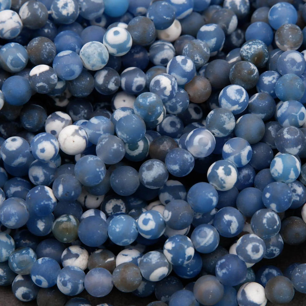 Close-up of blue and white marbled beads