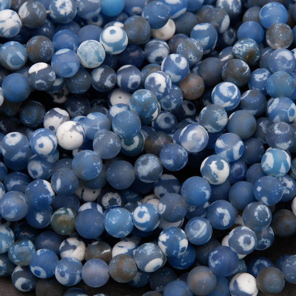 Close-up of blue and white marbled beads