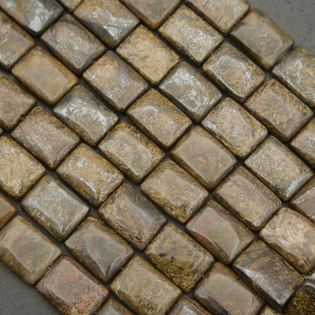 Close-up of a patterned tile with brown and gray hues