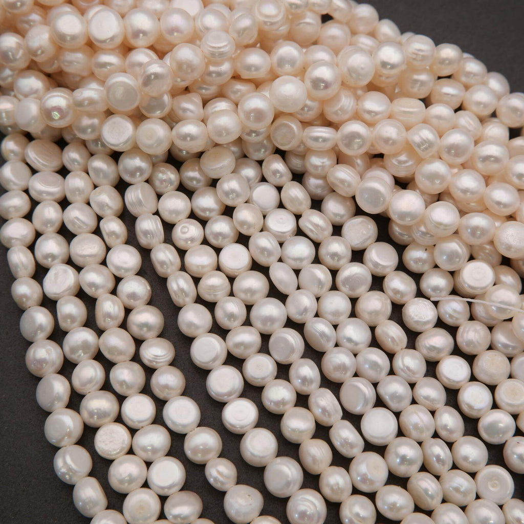 Close-up of a string of pearls on a dark background