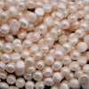 Close-up of a pile of light color pearls