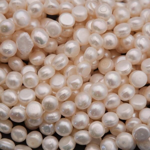Close-up of a pile of light color pearls