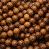 Close-up of brown spherical objects with a dark background