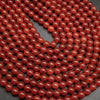 Red carnelian agate beads.