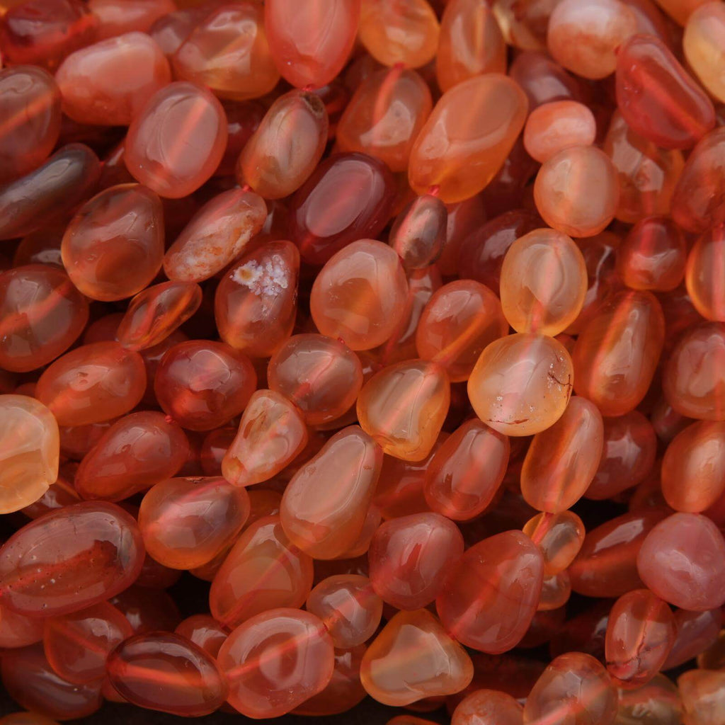Close-up of red and orange marbled stones