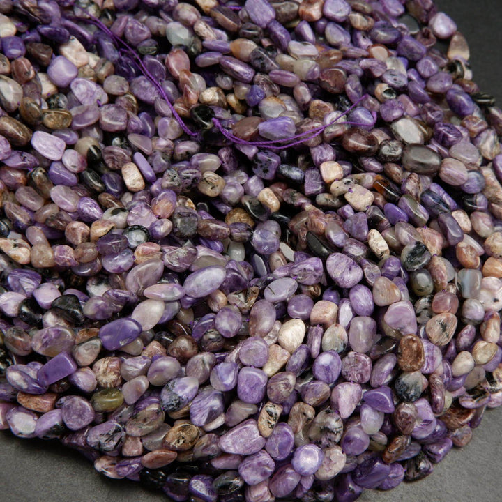 Charoite pebble shape beads.