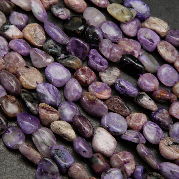 Charoite pebble shape beads.