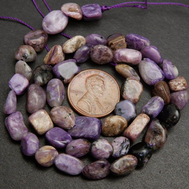 Charoite pebble shape beads.