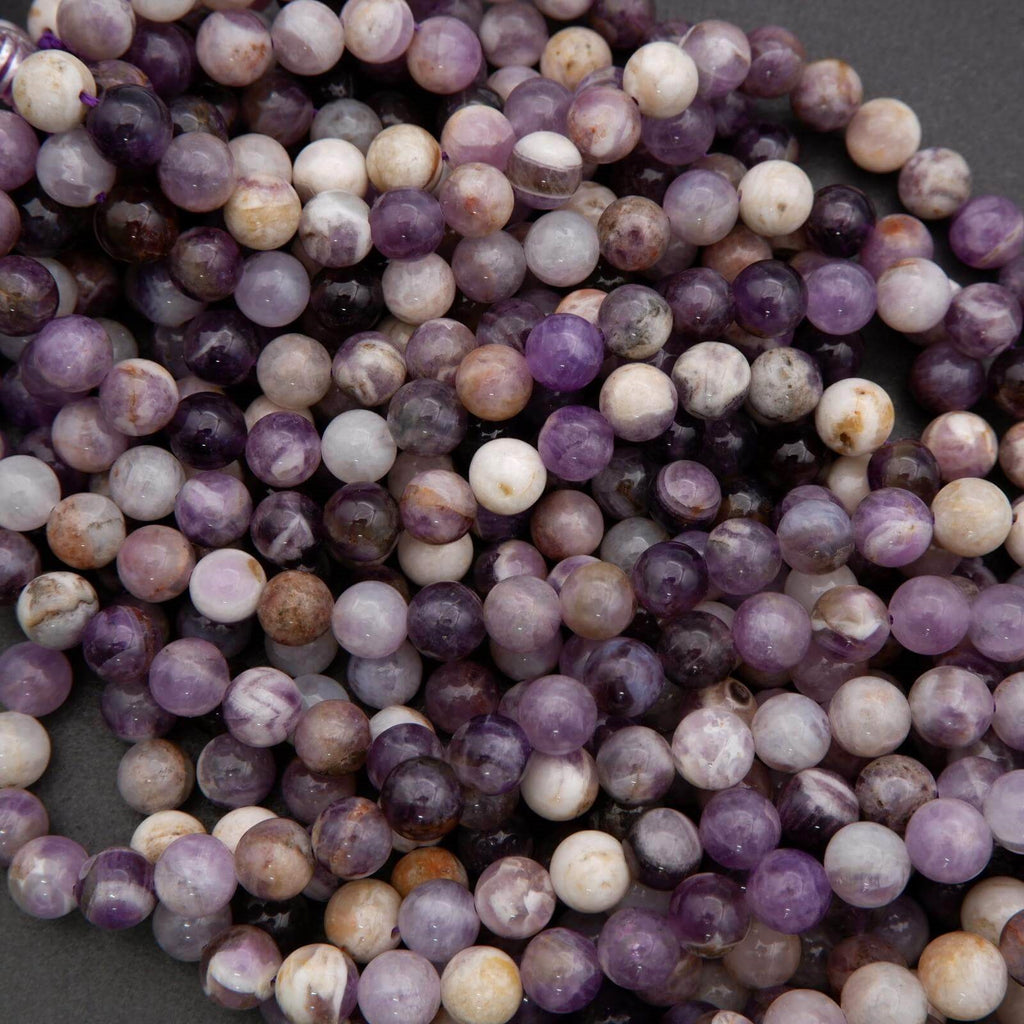 Close-up of multicolored beads on a dark background