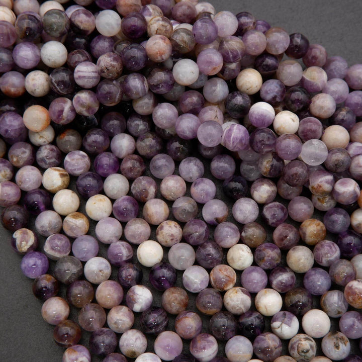 Close-up of multicolored beads on a dark background