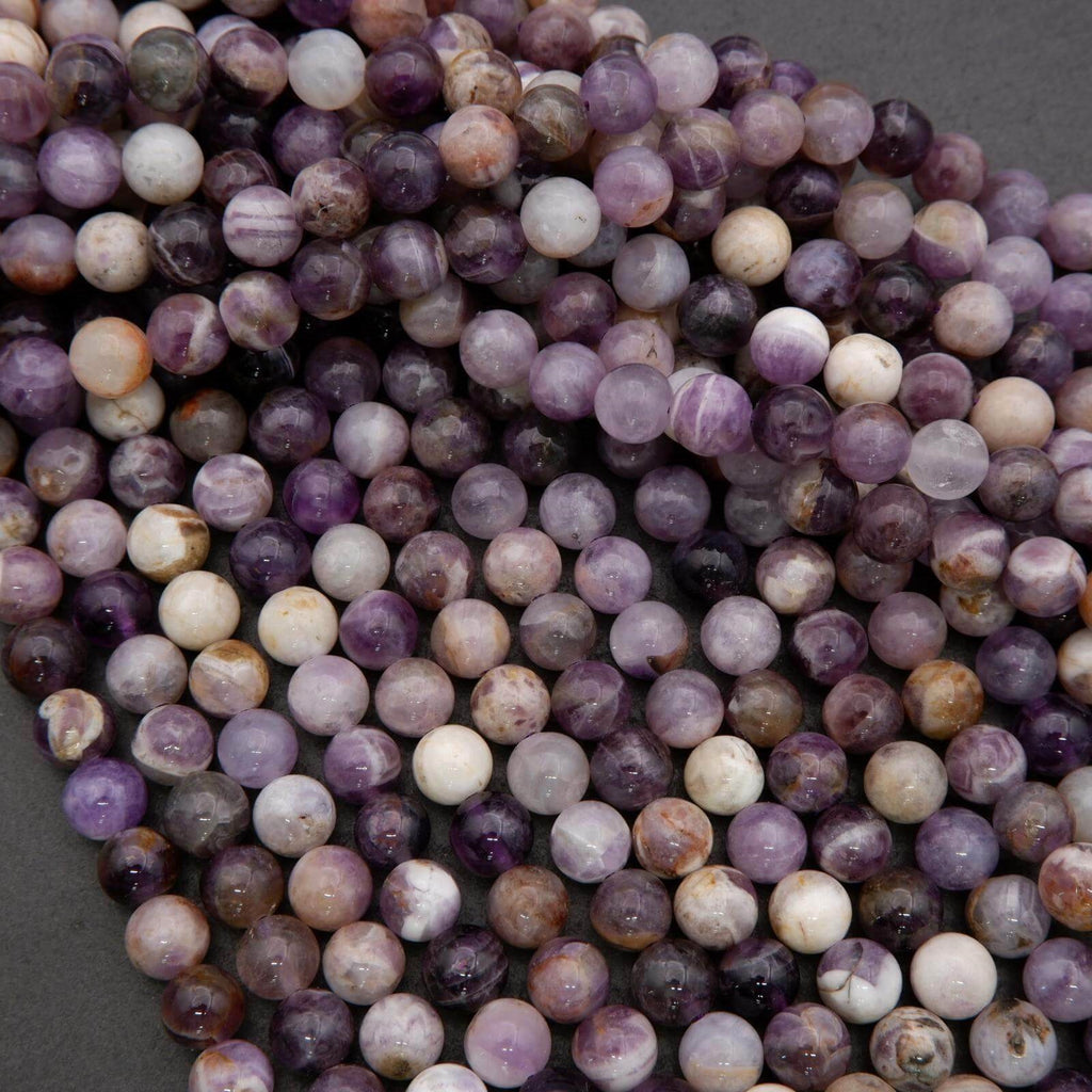 Close-up of multicolored beads on a dark background