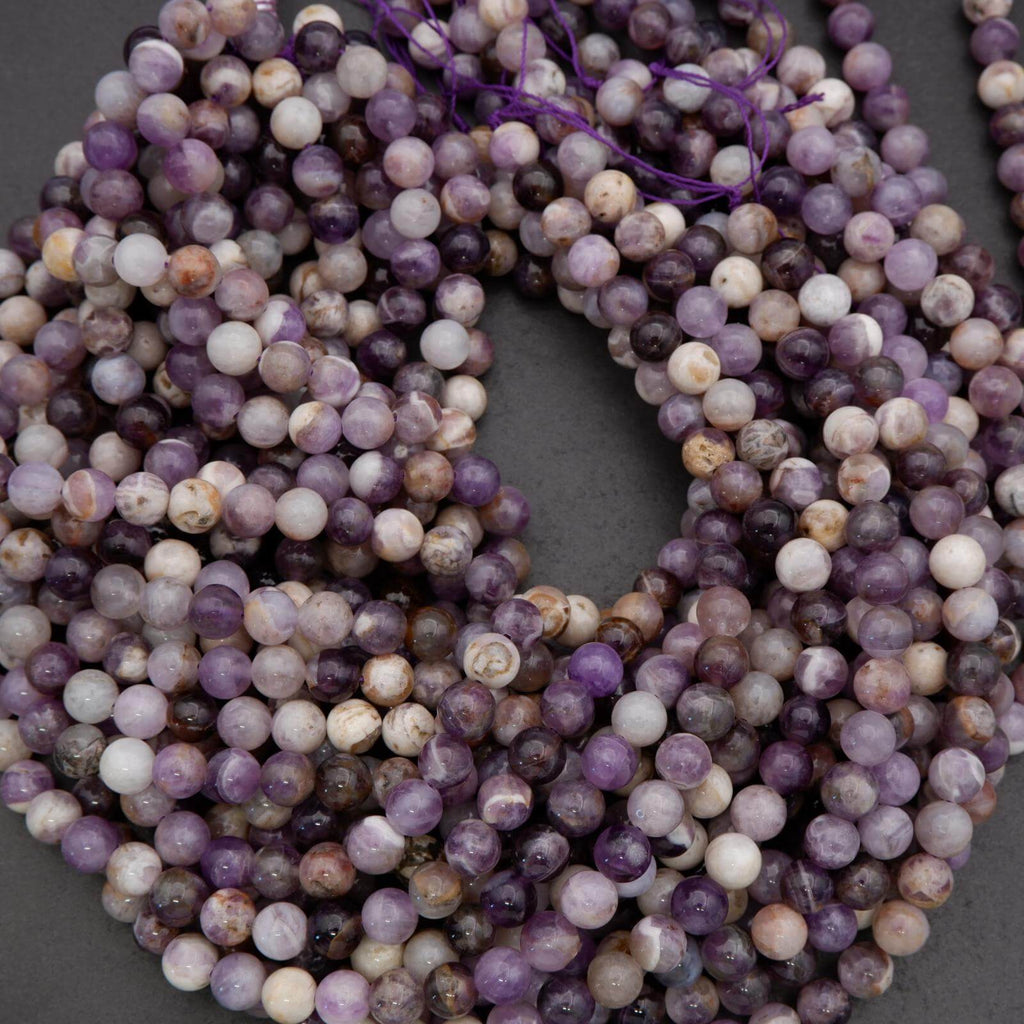 String of multicolored beads on a dark background