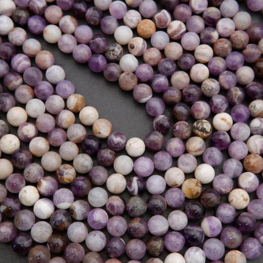 Close-up of multicolored beads on a dark background