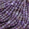 Close-up of purple and pink beads