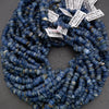 Blue beads with labels on a gray background