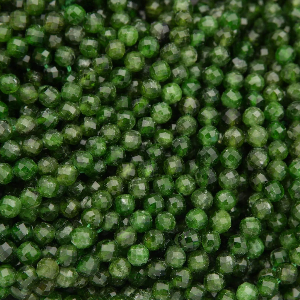 Close-up of green beads with a faceted texture