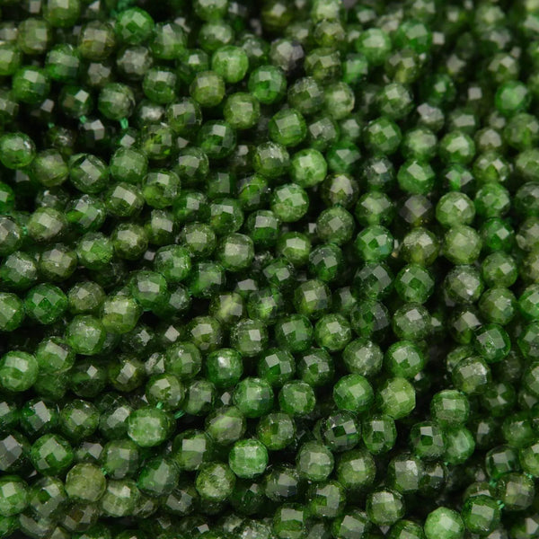 Close-up of green beads with a faceted texture