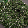 Close-up of green and white beaded necklace