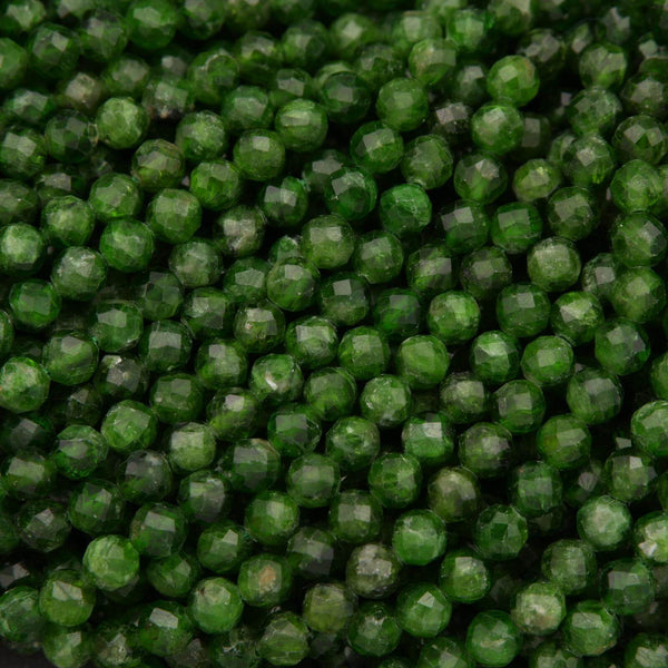 Close-up of green beads with a faceted surface