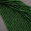 Close-up of green beads on a gray background