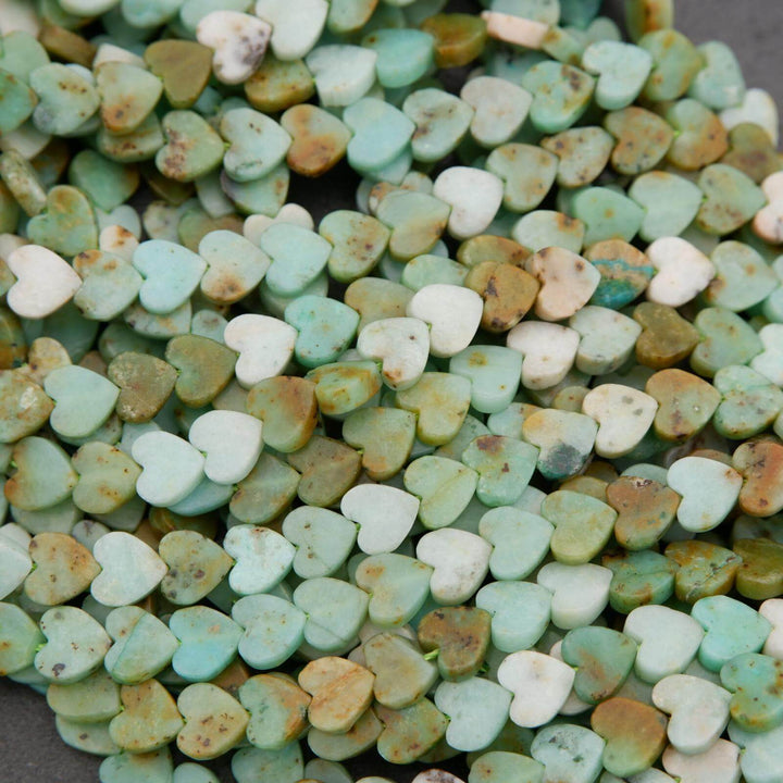 Heart-shaped stones in various shades of green and brown.