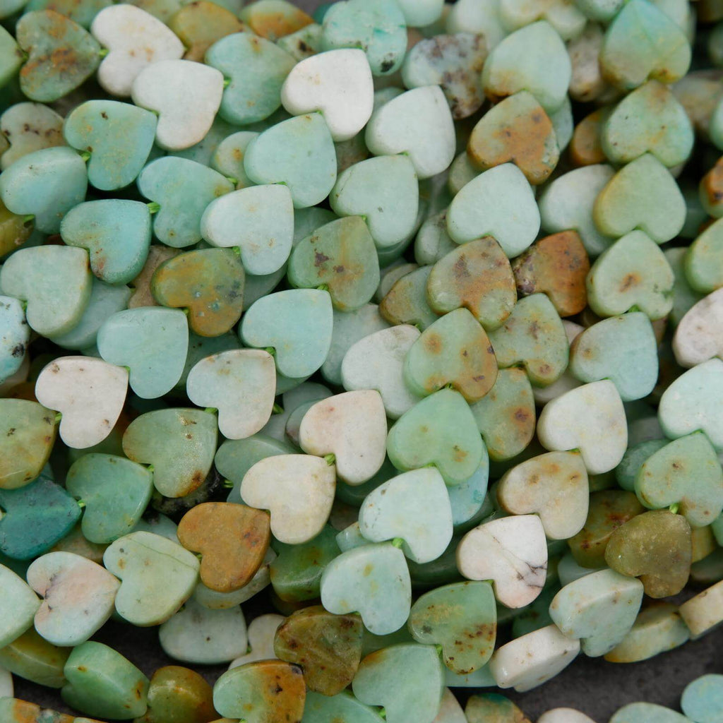 Heart-shaped stones in various shades of green and brown.