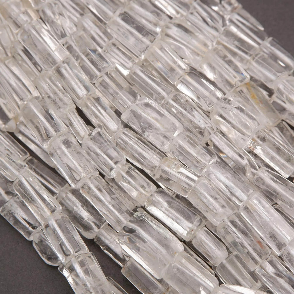 Close-up of clear glass mosaic tiles on a dark background